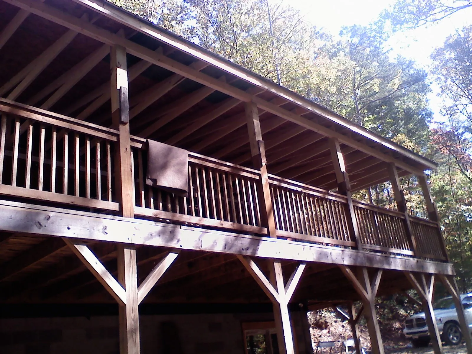 Timber framing under a new elevated porch and deck — Roof Leak Repair in Hickory Hills by Roofing Brothers
